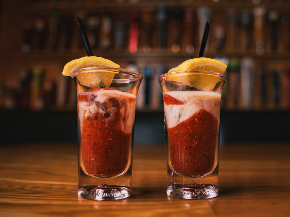 Oyster shooters served at Barge Inn Tavern bar, Newport Oregon