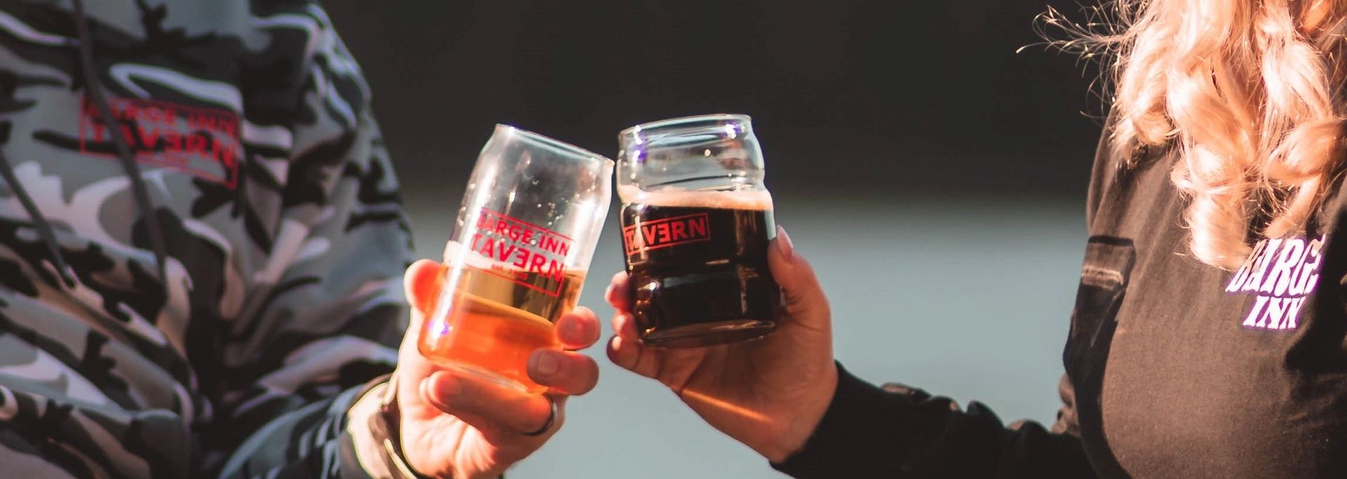 Cold pints and a cheers at Barge Inn Tavern Newport Oregon