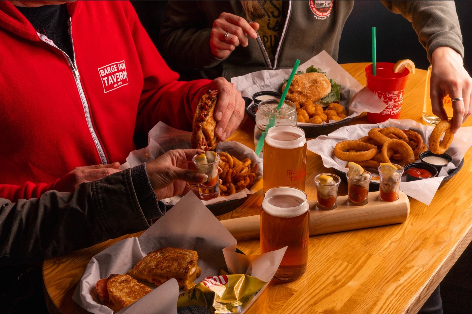 Drinks and bar food spread at Barge Inn Tavern Newport Oregon